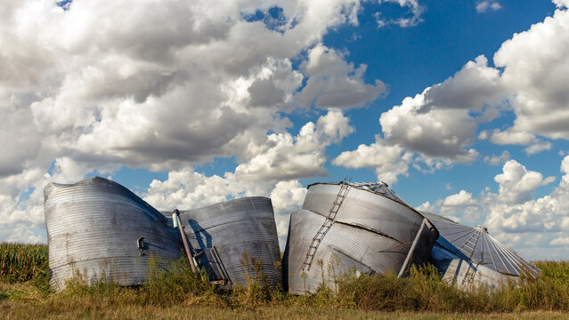 Landscape with windstorm damaged grain silos