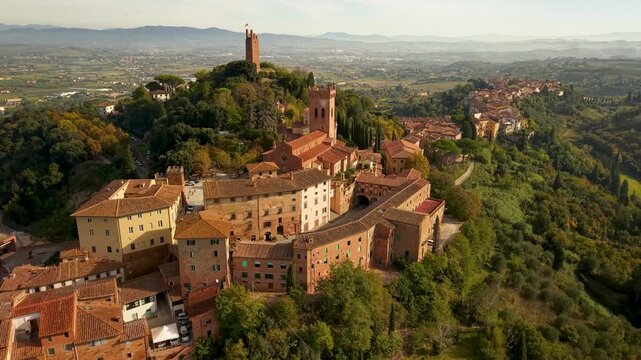 Landscape view of San Miniato hilltop town surrounded by Tuscan countryside. Authentic Italy. cinematic drone footage 4k 60 fps
