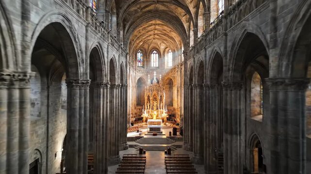 Cathedral Interior's Grace: An awe-inspiring perspective of the cathedral's interior, featuring an ornate altar and dramatic arches, all bathed in soft, natural light.