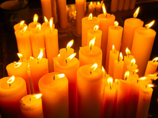 Warm glow of flickering candles creating cozy ambiance