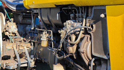 An agricultural tractor. View of the engine and cooling radiator. © lesyeuxdedidi