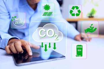 CO2 emission reduction concept with a man working to improvement a factory or facility for reduce waste pollution and compiled environment standards