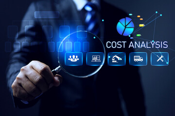 cost analysis concept with businessman holding magnifying glass to analyze factor of business to improve process and increase productivity