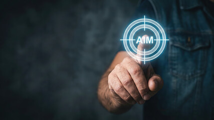 Business aim target high level planning concept with male hand touch virtual goal icon closeup focus motivation idea