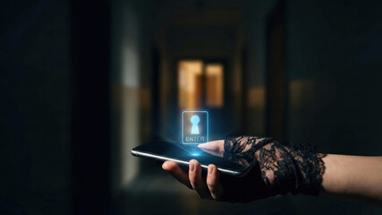 Cyber security high level planning concept secure smartphone in female hand wearing lace glove in dark corridor mysterious atmosphere