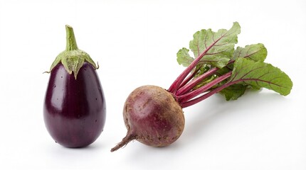Freshly harvested eggplant and vibrant beetroot with green leaves on a crisp white background