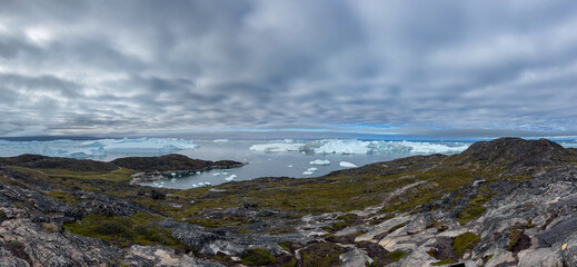 Arctic Ice Floes Drifting from Jakobshavn Glacier into Disko Bay © Michel