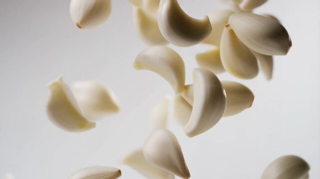 Floating garlic cloves in midair: dynamic motion of fresh ingredients