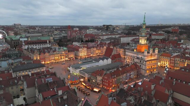 Aerial flyover over the center of Poznan in winter with Christmas decorations