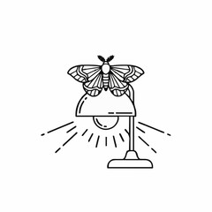 A moth flew into the light of a desk lamp. icon