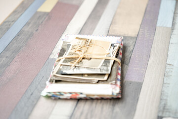 set Vintage empty photographs in female hand, Tracing family roots through images, journey into ancestry, family history and heritage, nostalgia antique artwork, family ties, memories childhood