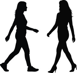 Silhouettes of two women walking in different postures