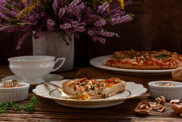 Homemade sweet open pie galette with brie cheese, pears and walnuts