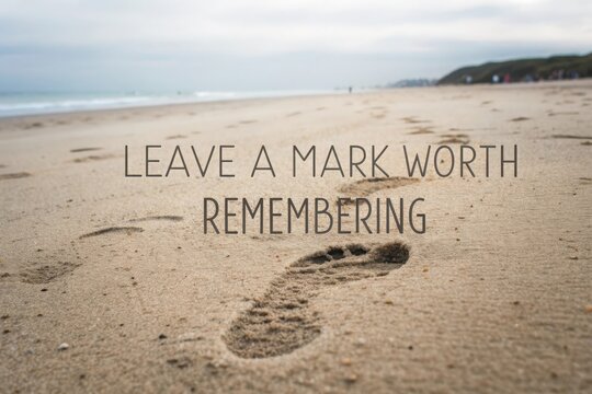 Footsteps Leaving Mark on Sandy Beach with Inspirational Quote