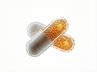 Two transparent capsules filled with golden micro-beads on a clean white background