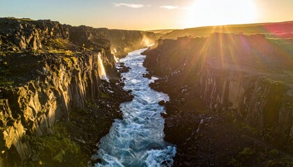 Dramatic River Gorge at Sunset - Icelands Majestic Landscape.