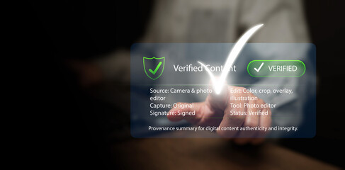 Verified digital content and provenance concept. A man touches check mark with box showing detail for authentication, transparency, metadata, and integrity of media through technology interface.