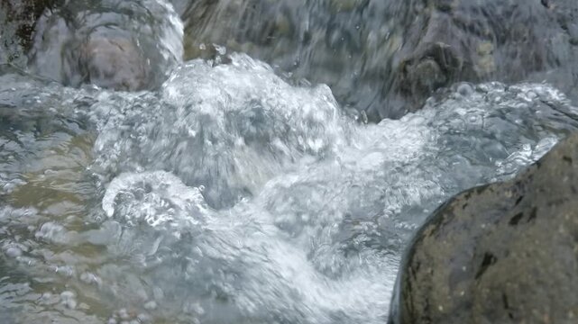 Java, Indonesia, South East Asia: Daytime Clear River With Smooth Stones