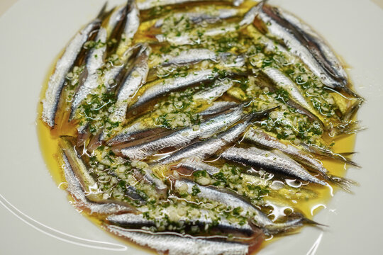Overheard shot of Anchovies Marinated in Vinegar (Boquerones en Vinagre), Spanish tapas	
