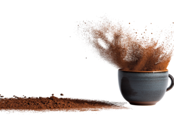 A dark blue ceramic cup with brown powder exploding upwards and spilling onto a surface isolated on a transparent background