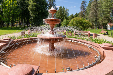 Fountain jets in a summer park on a sunny day