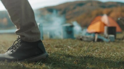 bride and groom legs walking together in the forest. Romantic wedding couple enjoying nature outdoors' slow motion footage