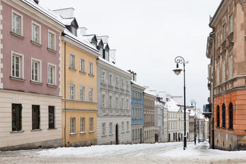 Obraz premium January 2026. Warsaw. Poland. The winter streets of Warsaw's Old Town. Historic buildings. Winter holidays.