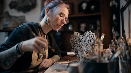Artist crafting intricate sculpture keepsakes that capture the essence of loved ones blending creativity with heartfelt commemoration.
