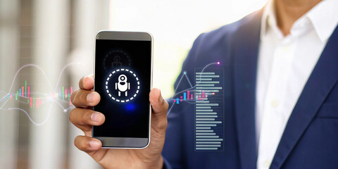 Businessman holding smartphone with biometric authentication icon