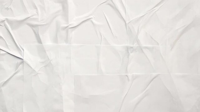 white crumpled and creased glued wrinkled paper poster texture background stop motion