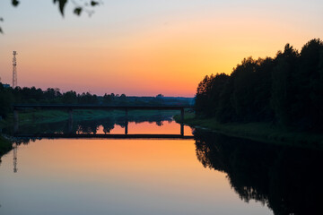 The Medveditsa River in the Tver region on a summer evening at sunset