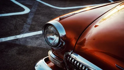 Fototapete Vintage Auto vintage car headlight. Orange retro car.  © Rimma