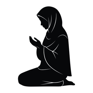 Silhouette of a muslim woman praying with her hands raised in supplication