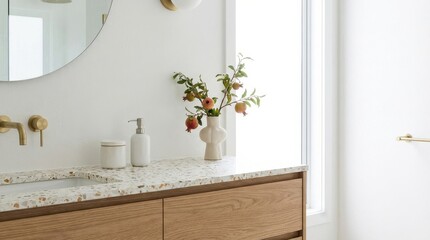 Modern bathroom vanity with terrazzo countertop and gold fixtures