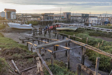 Carrasqueira palafitic port with fishing boats at low tide