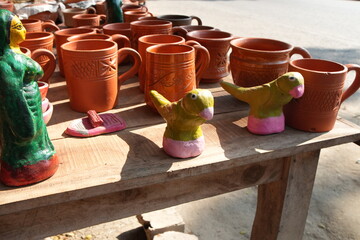 Handmade Terracotta Pottery and Clay Figurines on Display