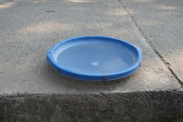 Blue Water Basin on Concrete Surface
