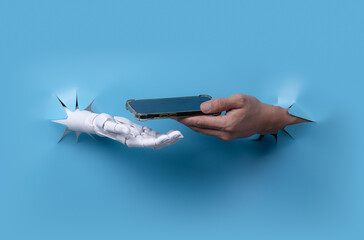 Digital Data Transfer: Robot Hand Receiving Smartphone from Human Hand through Paper