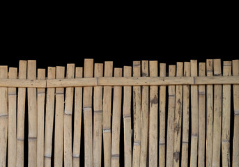 Natural bamboo wall: Asian style fence isolated on a black background