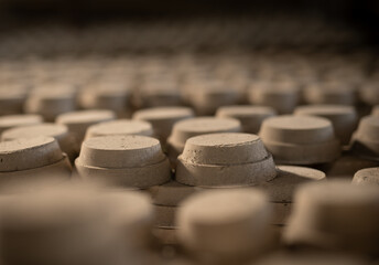 Ready-to-use compressed earth: Rough texture material in a manufacturing plant