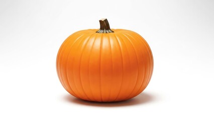 Obraz premium Single, unblemished, ribbed orange pumpkin against a bright white background