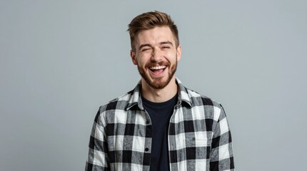 Fototapeta premium Man smiles while wearing a checkered shirt in a plain background at an indoor location Generative AI