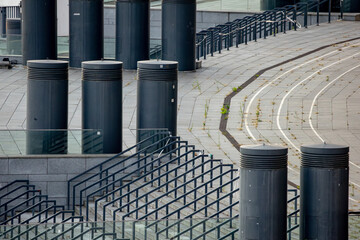 Modern urban stairs and black pillars in Kyiv