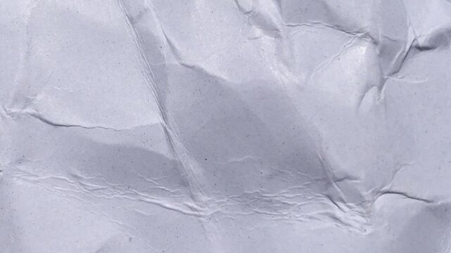 White crumpled paper stop motion background texture.White moving paper texture.Animated white clean empty crumpled paper background,Crumpled white paper texture pattern stop motion animation backgroun