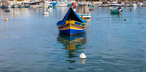 Marsaxlokk Harbour Malta with the traditional fishing boats.
