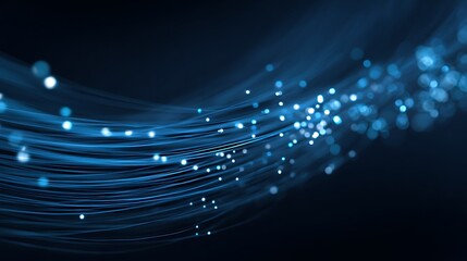 Flowing blue illuminated fiber optics, bokeh background, representing connection and data transfer