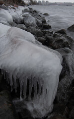 A frozen boulder besides the Baltic Sea at Helsinki