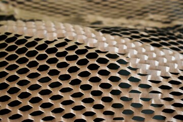 Close-up of honeycomb paper packaging texture used for eco-friendly protective packing and sustainable material concepts