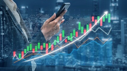 A business professional engages with a smartphone displaying a vibrant stock market graph, symbolizing financial growth and investment strategies in a modern urban environment. Copula