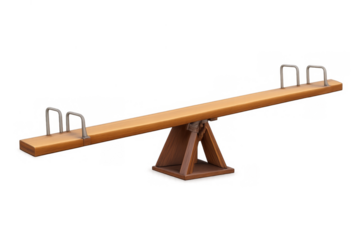 Wooden seesaw balancing on a pivot point, illustrating childhood fun, play, recreation, teamwork, and equilibrium